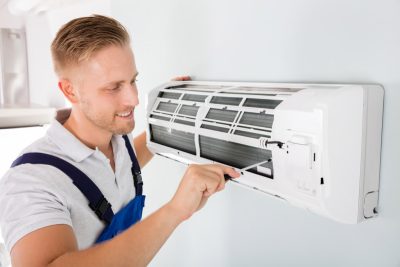 Important-Considerations-for-AC-Installation-and-Update – Copy HVAC technician cleaning and repairing a ductless mini split AC in Spanish Fork, UT